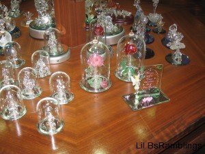 Small glass roses in covers designed like The Beast's cursed rose.