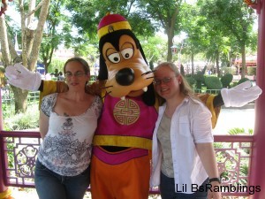 Me and my friend posing with the lifesize Goofy character.