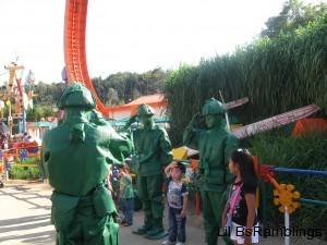 Green soldier characters drill children at the Hong Kong themepark.